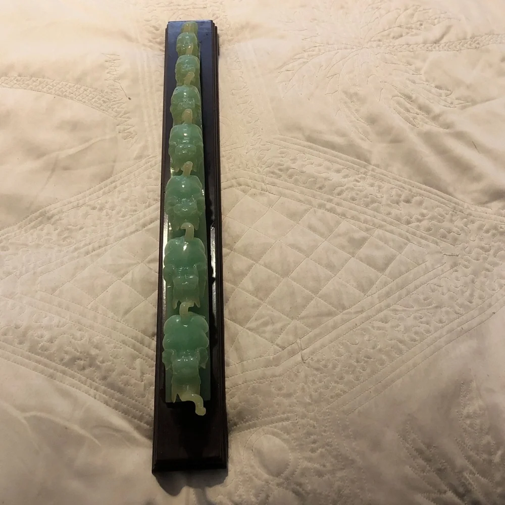 Green Jade-like Linked Figurine Display